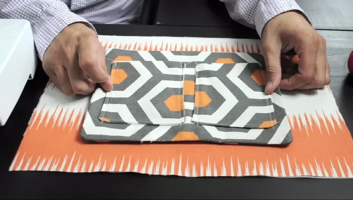 Construct the larger inside pocket: Sew the 11 x 8 1/2 inch piece to the back inside body piece.