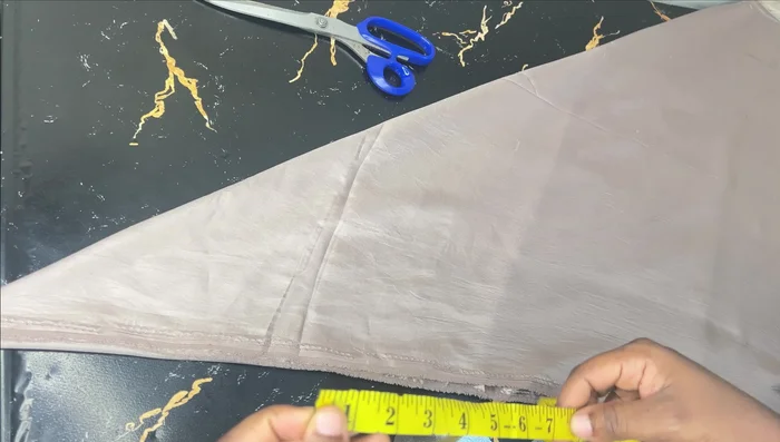 Connect the waistline, hipline, and skirt length marks to create the skirt pattern. Maintain a relatively straight line from the hip to the hem for an A-line effect.