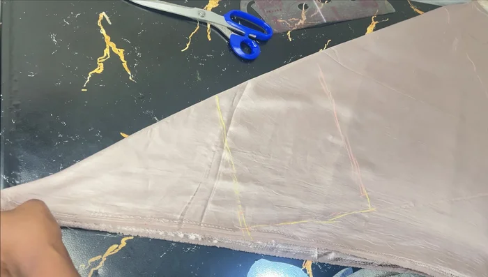 Connect the waistline, hipline, and skirt length marks to create the skirt pattern. Maintain a relatively straight line from the hip to the hem for an A-line effect.