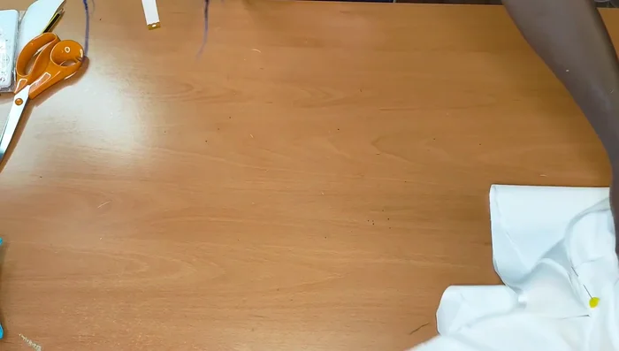 Pin and stitch the side seams of the skirt, right sides facing each other. Stitch the top.