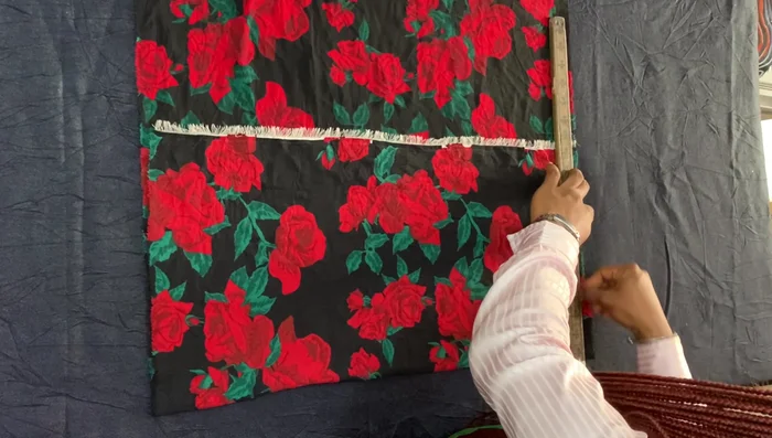 Draw straight lines connecting marked points, leaving a straight bottom edge for gathering.