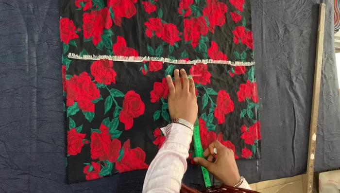 Draw straight lines connecting marked points, leaving a straight bottom edge for gathering.