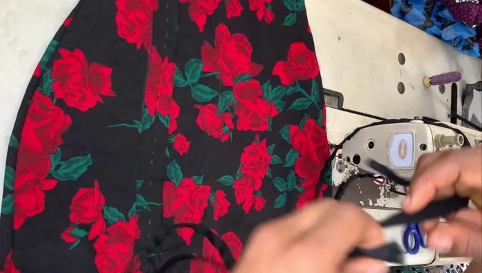 Insert one rope into each casing, ensuring the closed end is facing outwards. Guide ropes to the top using broomstick and tuck ends.