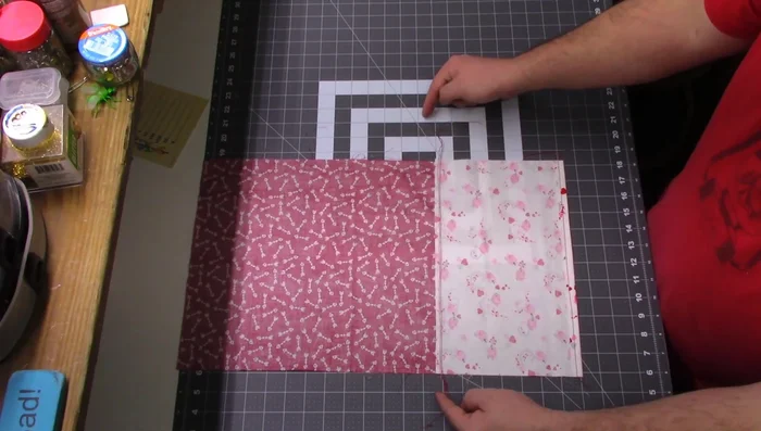 Fold and sew the top edge: Fold the fabric 1 inch down from the seam, press, and sew a 1/4" seam allowance.