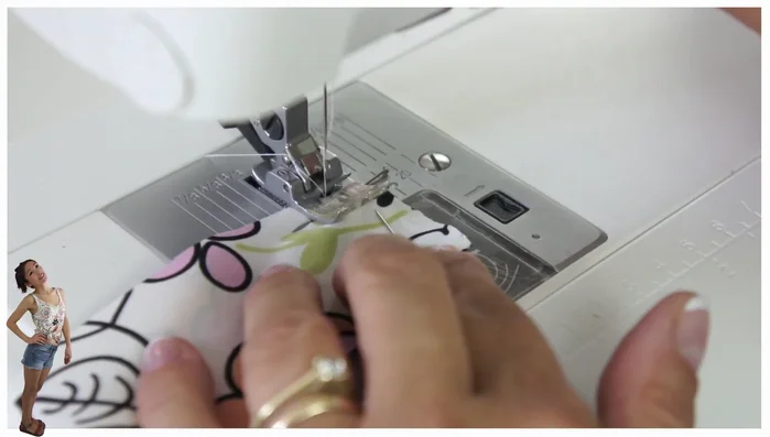 Trim and finish neckline: Trim the excess bias binding to about 3mm. Fold over and topstitch the bias binding to the neckline, resulting in a single stitching line.