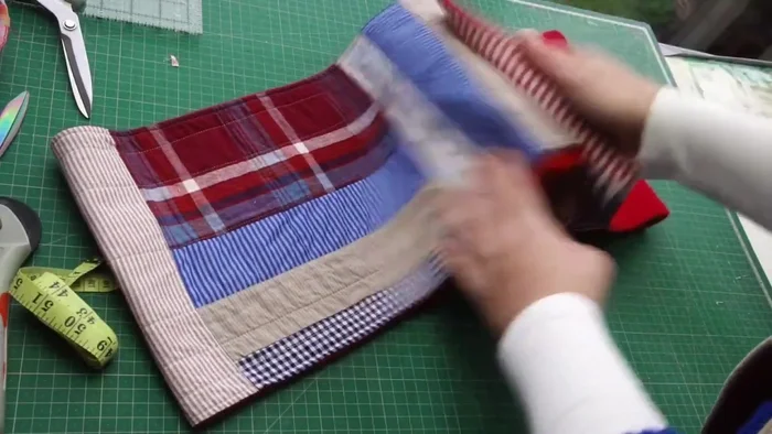 Prepare Fabric Blocks: Square up your fabric blocks to the desired finished size (e.g., 10.5 inches unfinished, resulting in 9.5 inches finished). The tutorial uses 8 blocks for an approximately 80-inch-wide scarf.