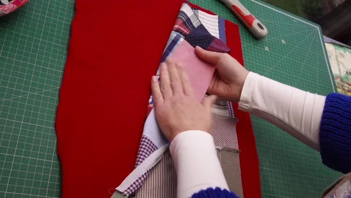 Pin and Sew Fleece to Fabric: Place the right side of the fabric strip against the right side of the fleece. Pin generously, especially around the edges, to prevent shifting during sewing. Use a walking foot to sew all around, leaving a gap for turning.