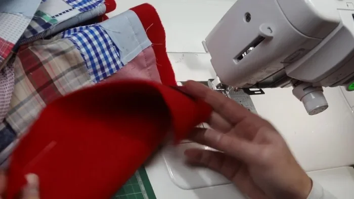 Trim and Turn: Trim the excess fleece and fabric around the edges. Carefully clip the corners. Turn the scarf right side out through the gap, pushing out the corners to create sharp points.