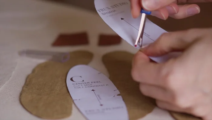 Create drill marks: Transfer drill marks from the pattern onto the fabric using a pin or seam ripper to create small holes.