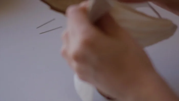 Attach outer peel to lining: Match outer and lining pieces at drill marks, pin and stitch leaving a gap for turning.