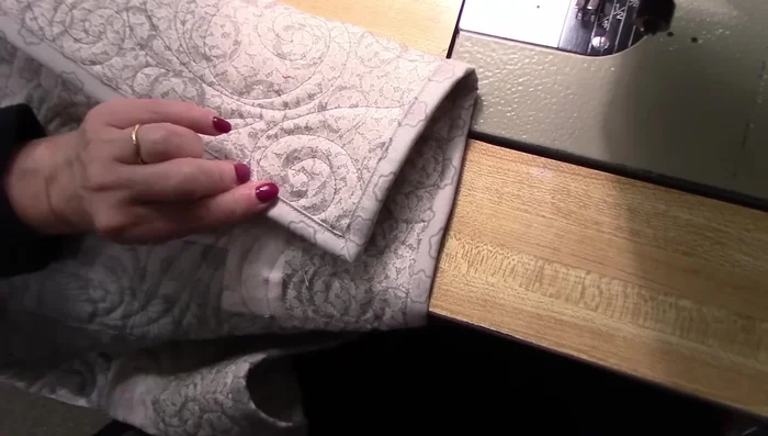 Steam press the edge to make the binding lie flat.