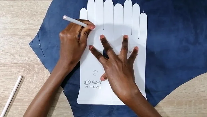 Cut out the pattern pieces: two trunk pieces, two thumb pieces, six right faucet pieces, and six left faucet pieces.