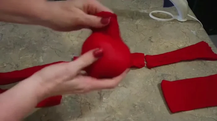 Trim excess fabric from the top of the sack.