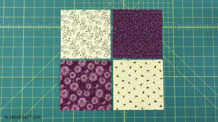 Prepare four 5x5 inch squares: two light, two dark. Arrange them diagonally.