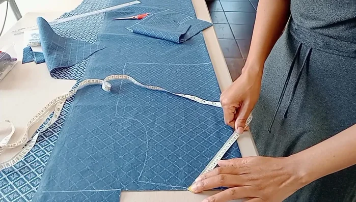 Adjust Front Bodice: Extend the neckline to 22cm, adjust armhole, and re-mark bust points considering the button placket.