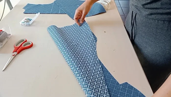 Create Neckline Facing: Trace the neckline onto scrap fabric, adding 4cm width.