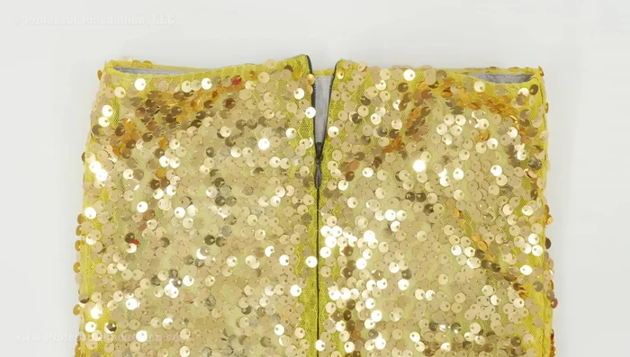 If adding a zipper, use an invisible zipper and hand-sew it in after removing sequins from the seam allowance, taking care not to obstruct the zipper’s function.