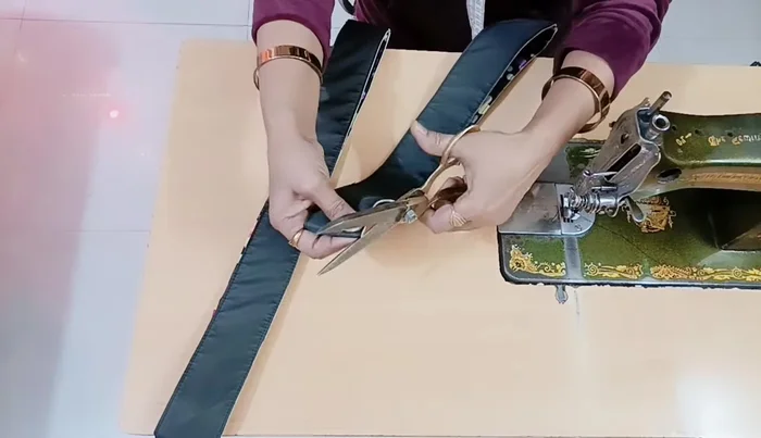 Attach the main fabric pieces together, and prepare piping: Attach the long zipper (34 inches) and piping.