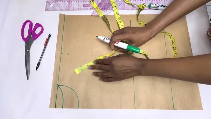 Mark shoulder length, armhole length (minus 1 inch for modesty), and connect points to form the shoulder slope and armhole.