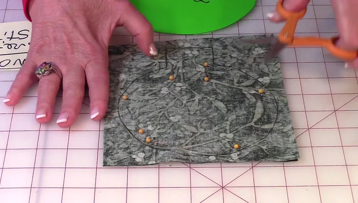 Cut along the drawn line.