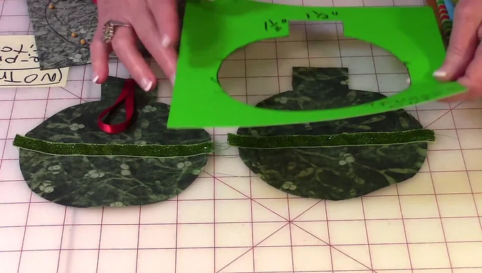 Stitch the trim onto the second piece.