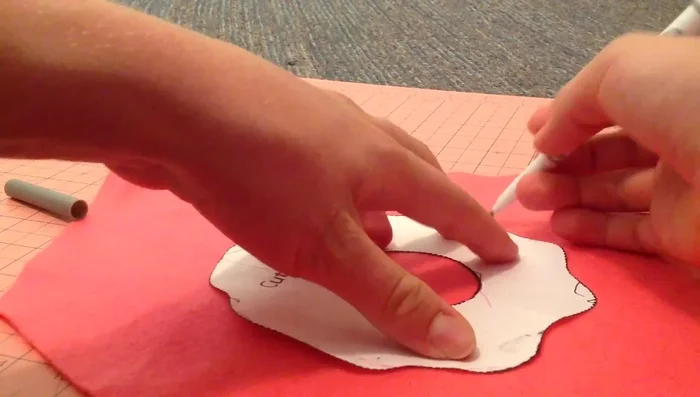 Cut out the felt icing shape.