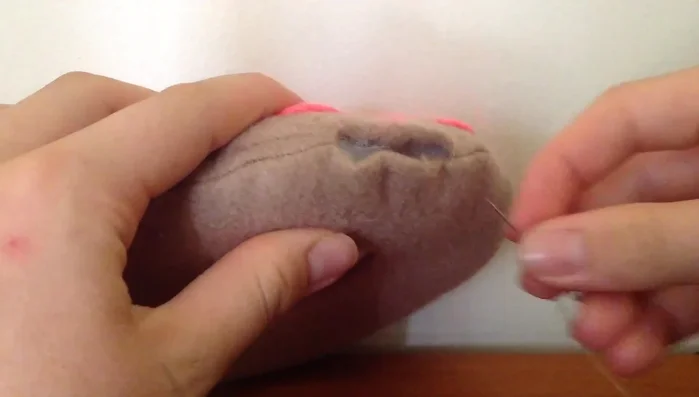 Hand sew the hole closed.