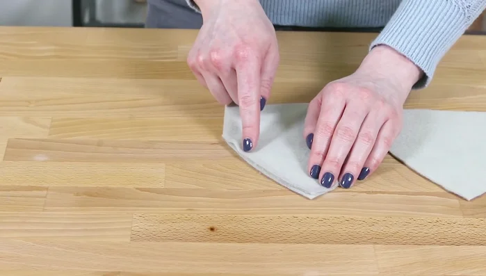 Pin the top and bottom pieces together (right sides facing), aligning seams and ensuring ear flaps face up. Sew all the way around.