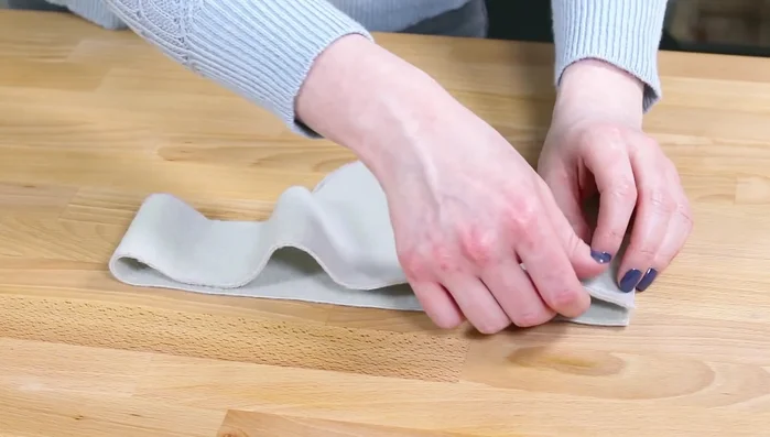 Pin the top and bottom pieces together (right sides facing), aligning seams and ensuring ear flaps face up. Sew all the way around.