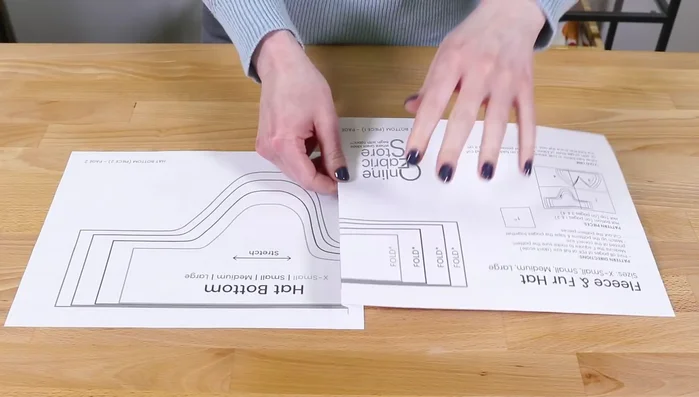 Cut two 1-inch wide by 18-inch long fleece strips for the ties.