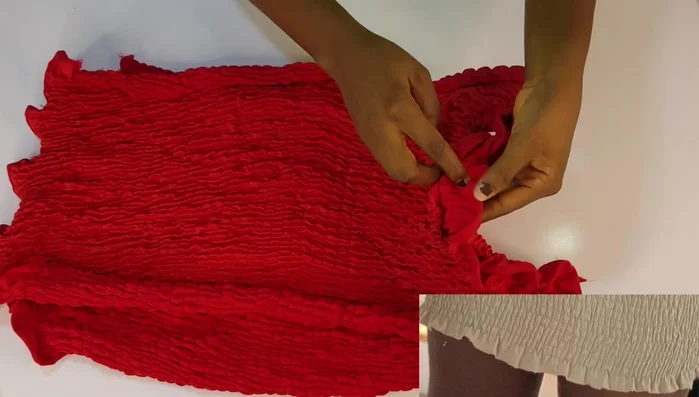 Join the front and back pieces: Attach the front and back pieces together at the armholes using regular thread, ensuring proper alignment.