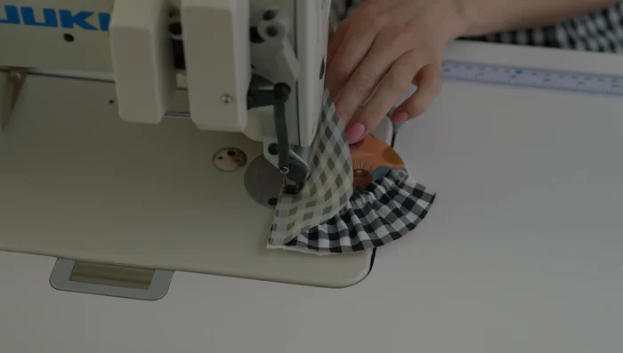 Trim padding and press seams: Trim the padding close to the seam to reduce bulk. Press the seams of the upper slipper for a smooth finish.