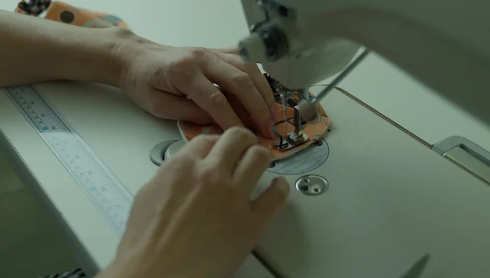 Attach the sole: Align the center marks of the upper and sole pieces and stitch them together with a 1/4 inch seam allowance. Sew around the entire perimeter.