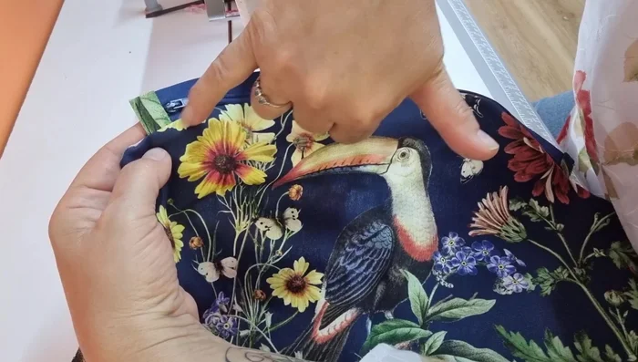 Top stitch: Top stitch along the zipper edges on both sides of the main fabric to secure the zipper and enhance the look.