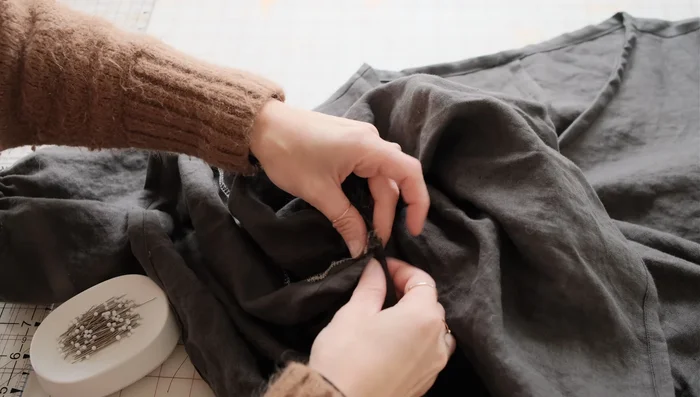 Attach the gathered bottom tier to the bodice, matching notches and side seams.
