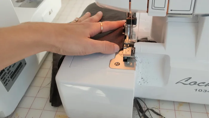 Assemble the Betty dress as per instructions, matching shoulder notches and attaching facings, bodice, and sleeves.