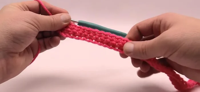 Fasten off the initial color and begin the graphghan section. Attach a new color (color #1) to the first stitch.