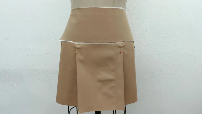 Finish skirt side edges with a serger or bias tape.
