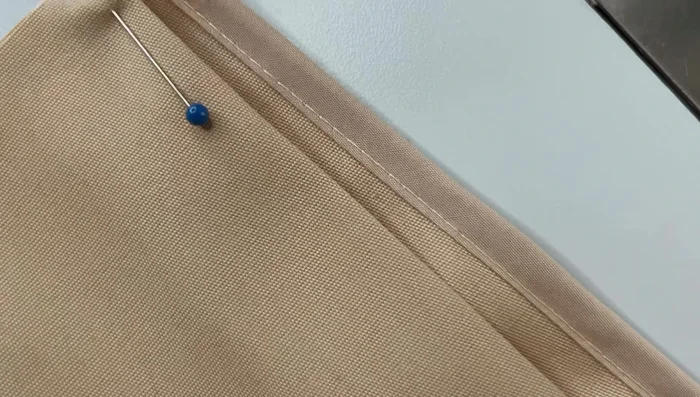 Sew the yoke to the skirt, matching center front notches. Press seam allowance towards the top of the waistband.