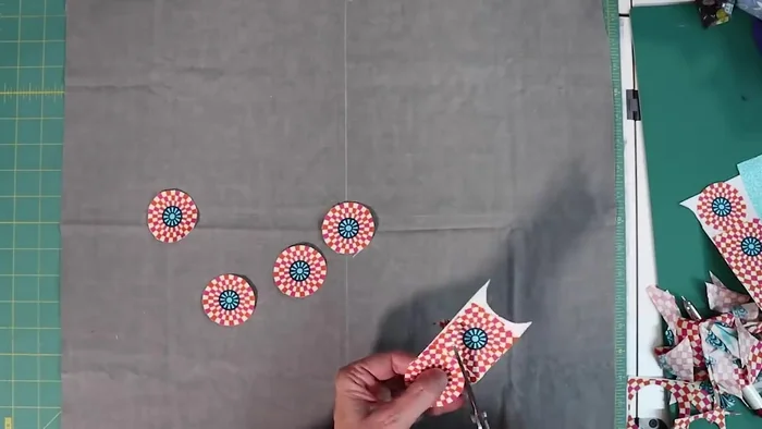 Fuse fabric scraps to Flexi Fuse, then cut out shapes.