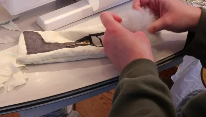 Sew the main torso together, leaving openings for arms and legs. Stuff and close the remaining openings.