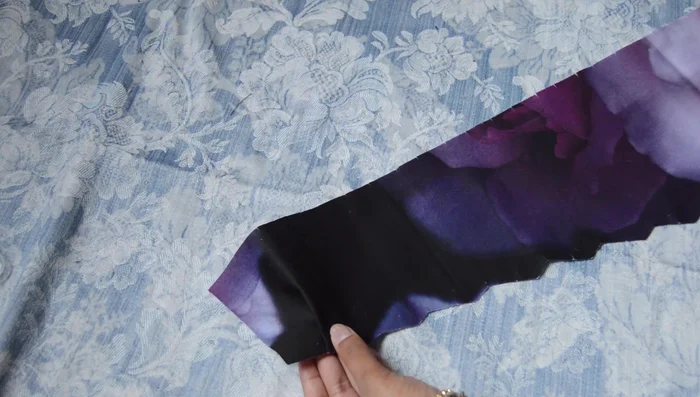 Cut bodice pieces from fabric, make notches to mark plate ends, fold and sew around plates with sewing machine.