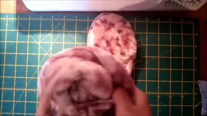 Attach the upper and sole pieces. Pin the upper and sole together, ensuring the right sides are facing out. Hand sew or machine sew all the way around.