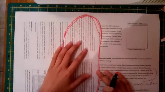 Create the slipper pattern. Fold the paper in half, and mark 4.5 inches from the middle line at the bottom. Connect this point with the top folded line, then create an inward curve 2 inches from the folded line for the slipper's inside.