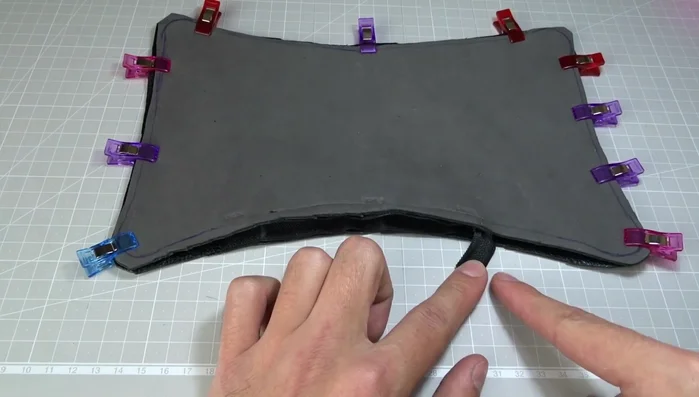 Sew around the perimeter of the pillow. Handle thick leather sections with care, potentially using a paper backing to reinforce the seam and prevent damage to the sewing machine.