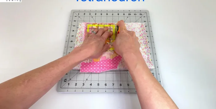 Cut out two pieces of fabric the same size and fuse fusible fleece to wrong side of fabric