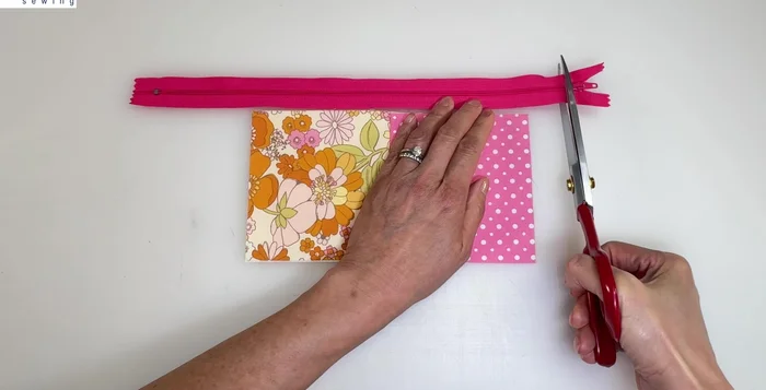 Prepare the zipper: Cut the zipper 1 inch longer than the fabric and remove the slider. Carefully unravel stitches to separate zipper teeth from tape.