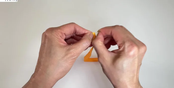 Create zipper loops using zipper tape or fabric/ribbon.