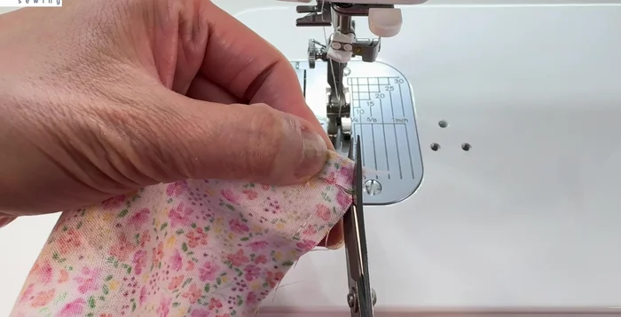 Trim corners, open up bottom seams, match and stitch together.