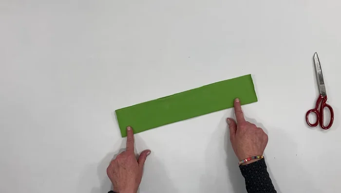 Cut fabric: 6 inches wide x (head measurement - 2 inches) long.